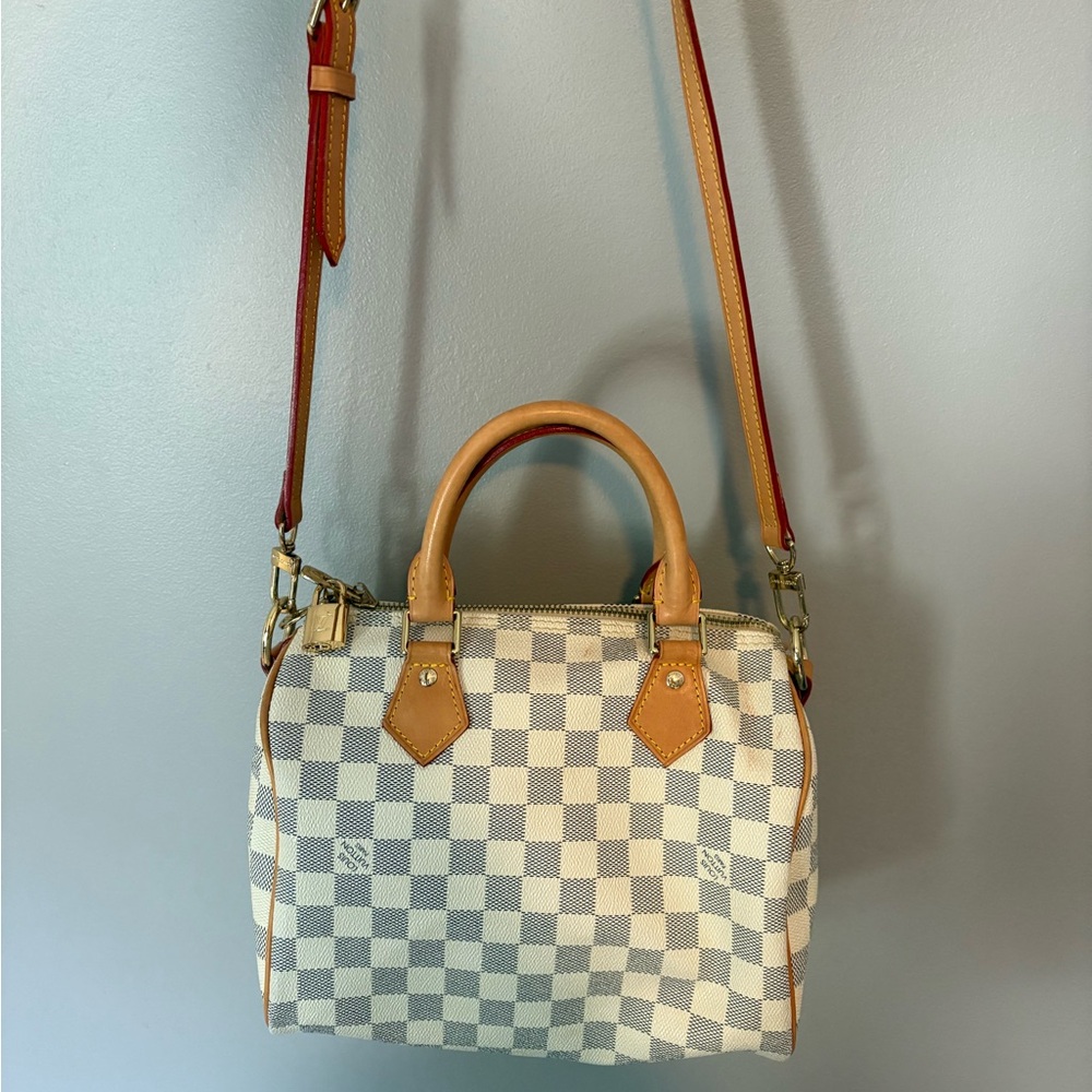 Louis Vuitton white checkered bag with red accents